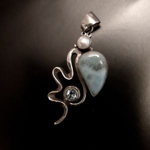 Sterling silver pendant with pearl and blue stones
